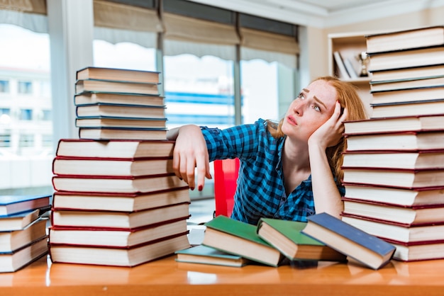 Young female student preparing for exams