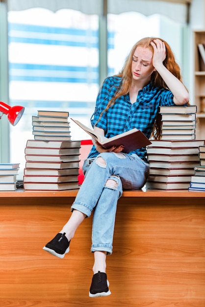 The young female student preparing for exams