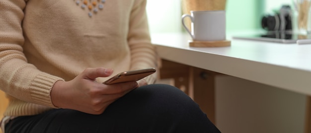 Young female using smartphone