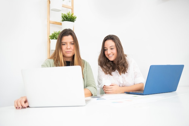 young female workers in their office during their working hours