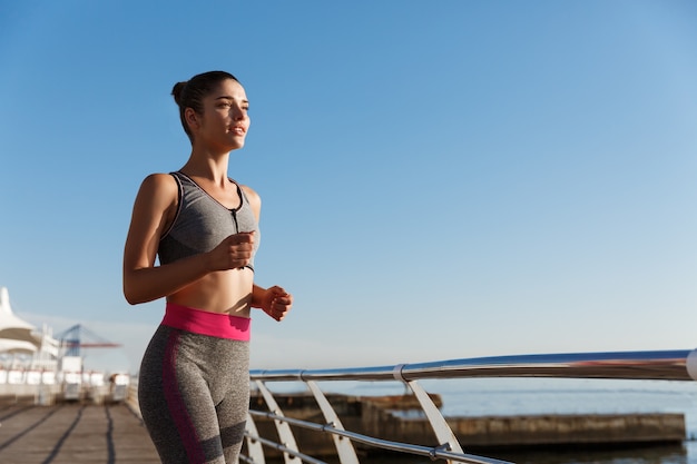 Young fit sportswoman working out