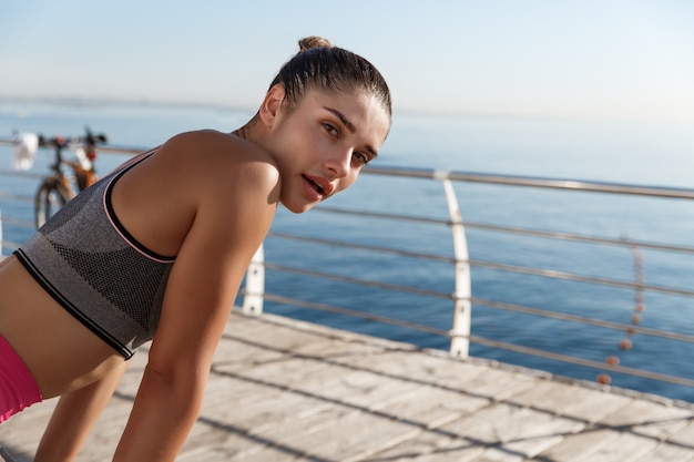 Young fit sportswoman working out