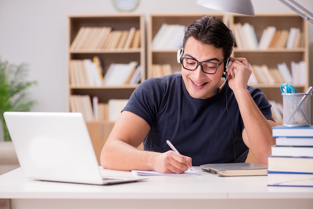 Young freelance worked working on computer