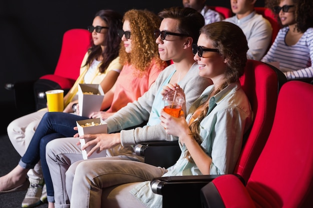 Young friends watching a 3d film