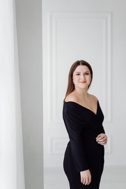 Young girl black dress portrait