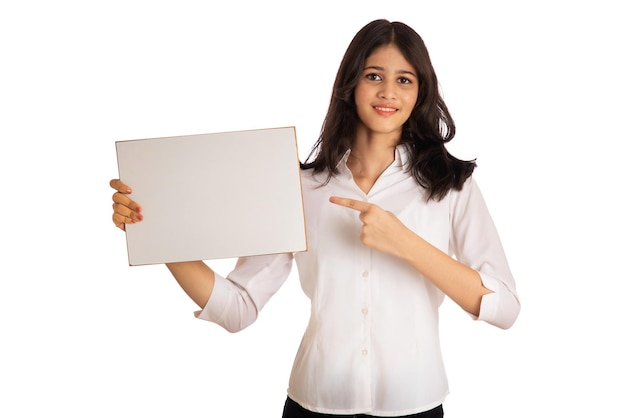 A young girl or businesswoman holding a signboard in her hands on a white background