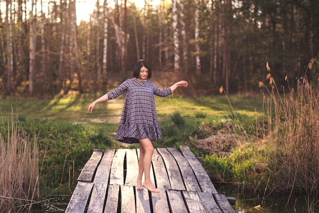 Young girl dancing in nature