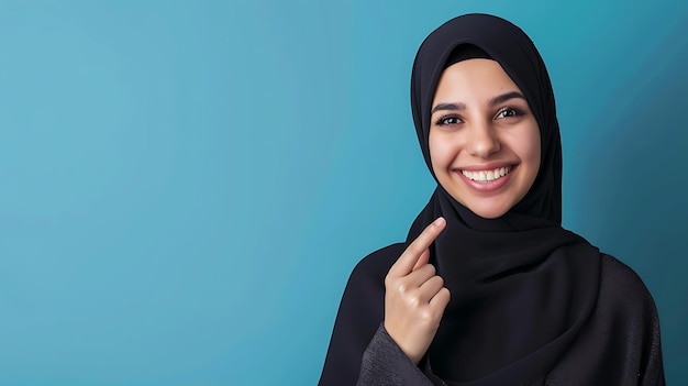 Young Girl in Headscarf Smiling on Blue Background