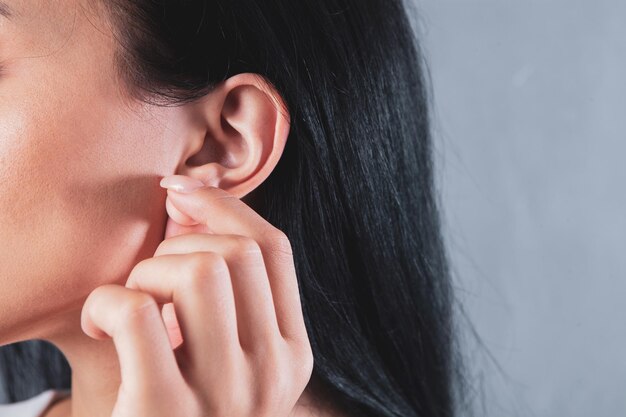 Young girl holding a lobe