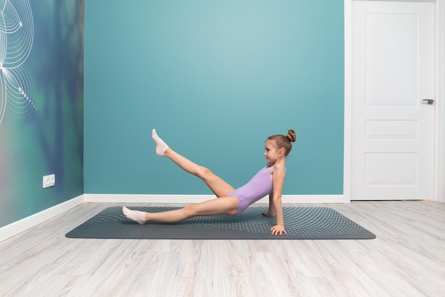 A young girl is engaged in gymnastics Sport Stretching