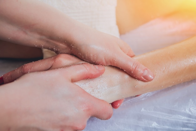 Young girl is relaxing in the spa.