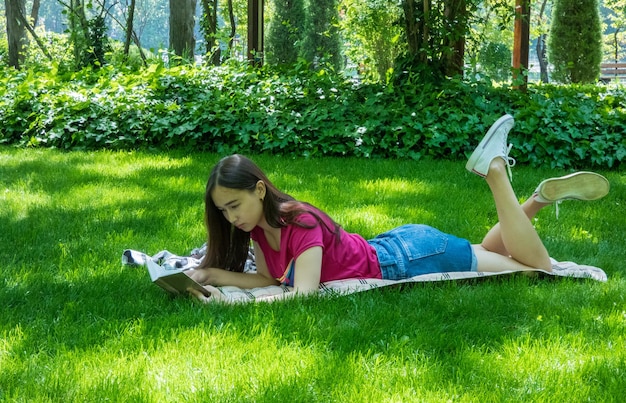 Young girl in a picturesque park