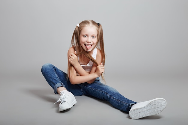 Young girl posing, grimaces