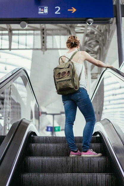 Young girl at the train station travelling