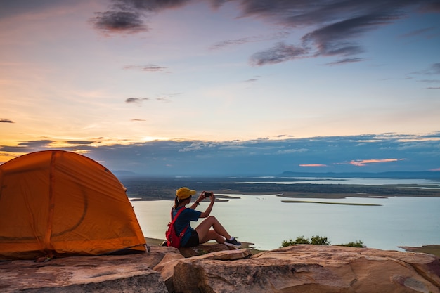 Young girl traveling   in Nam-Phong national park, Khon-Kaen province, Thailand.