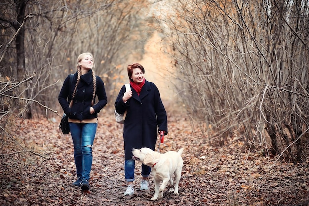 Young girl on a walk in the autumn