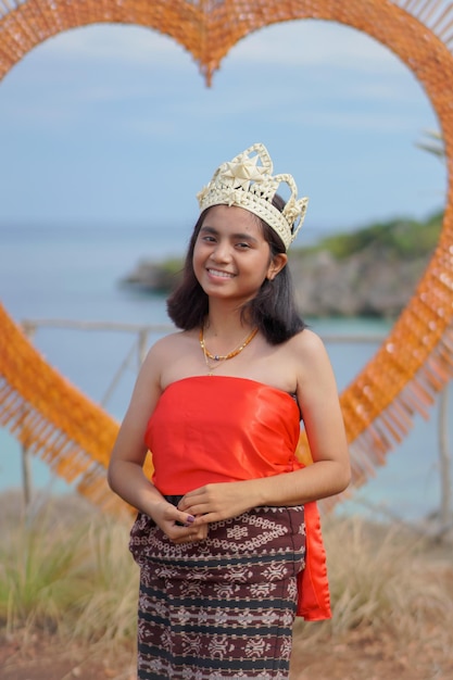 young girl wearing traditional clothes from sabu island