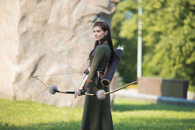 Young girl with arrows and bow