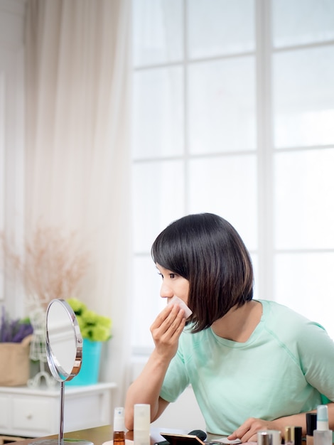 Young girl with makeup cosmetics