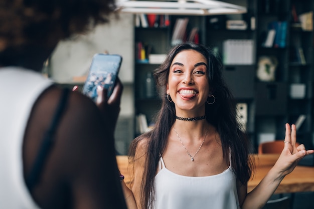 young girls taking photo and having fun