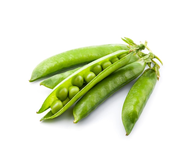 Young green pea pods on white backgrounds closeup. Healthy food.