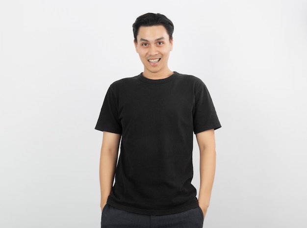 Young handsome asian man smiling with braces and looking at camera isolated on white background.