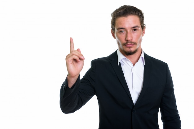 Young handsome businessman pointing finger up isolated