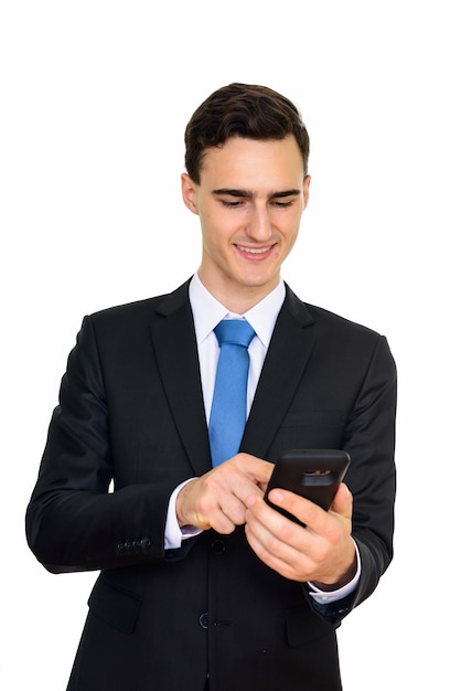 young handsome businessman in suit isolated on white