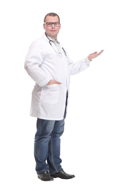 Young handsome doctor man wearing medical coat showing palm hand