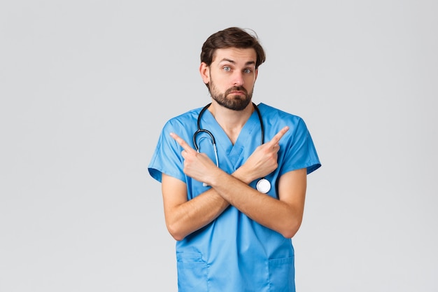 Young handsome doctor with a stethoscope