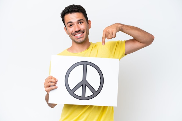 Young handsome man over isolated background