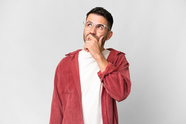 Young handsome man over isolated background