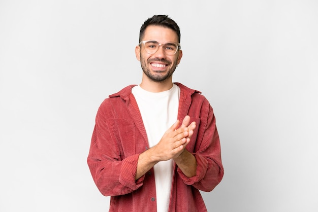 Young handsome man over isolated background