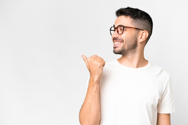 Young handsome man over isolated background