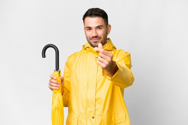 Young handsome man over isolated background