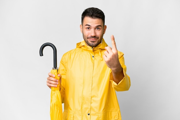 Young handsome man over isolated background