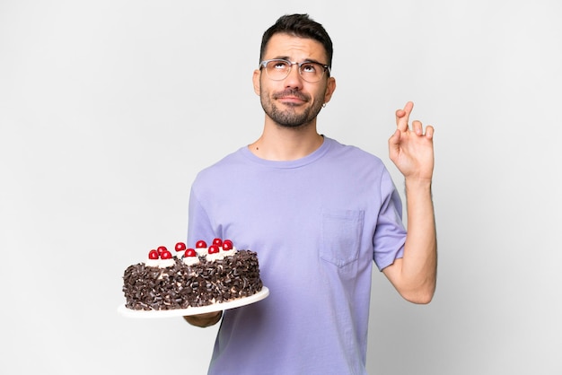 Young handsome man over isolated background