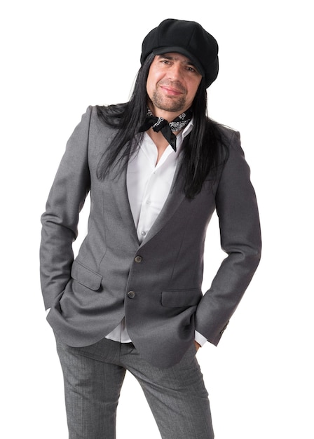 Young handsome man in modern cap on a white background