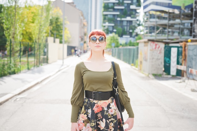 young handsome redhead caucasian woman posing