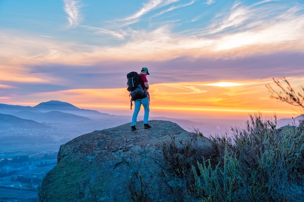 young hiker or backpacker in the mountains