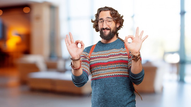 Photo young hippie man okay or alright sign