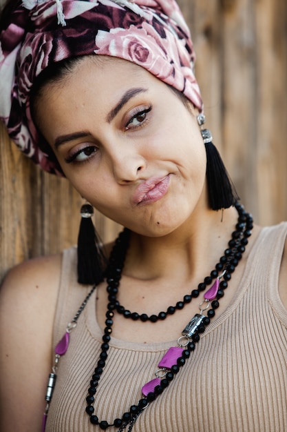 Young hippie style woman wearing handmade  jewelry