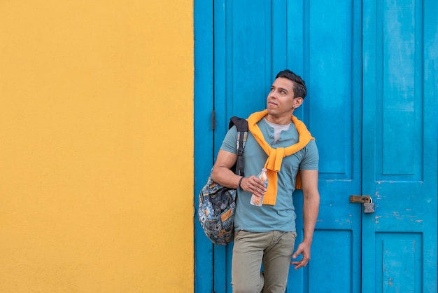 Young hispanic men with a bottle of water Panama - stock photo