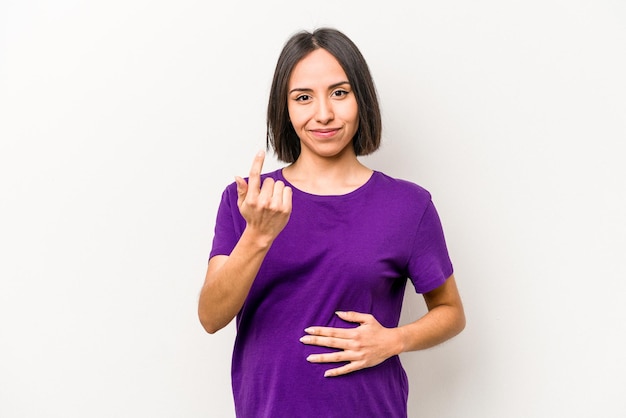 Young hispanic pregnant woman isolated on white background pointing with finger at you as if inviting come closer