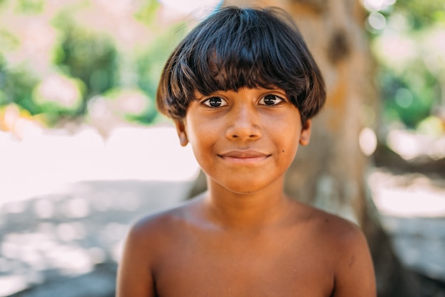 Young Indian from the Pataxo tribe of southern Bahia. Indian child smiling and looking at the camera