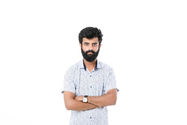 Young indian man giving expression over white background