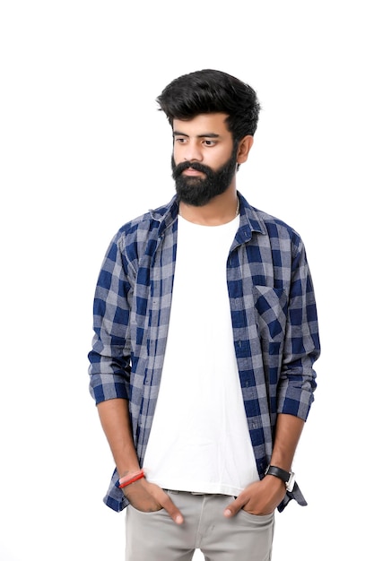 Young indian man giving expression over white background