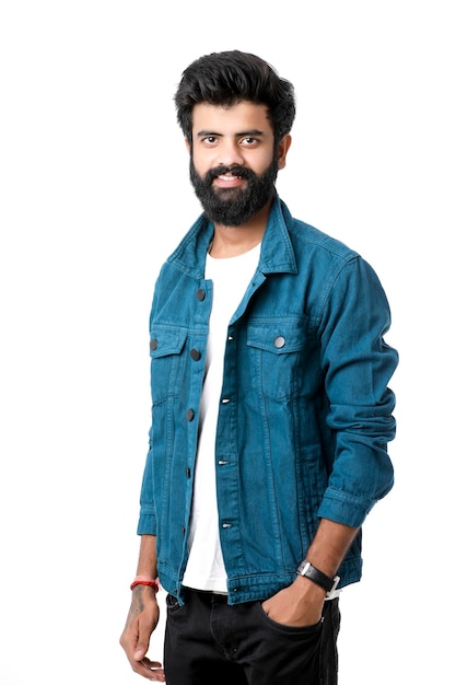 Young indian man wear jacket and giving expression over white background