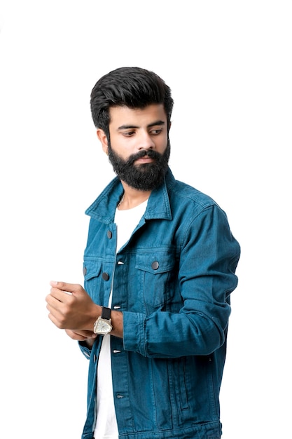 Young indian man wear jacket and giving expression over white background