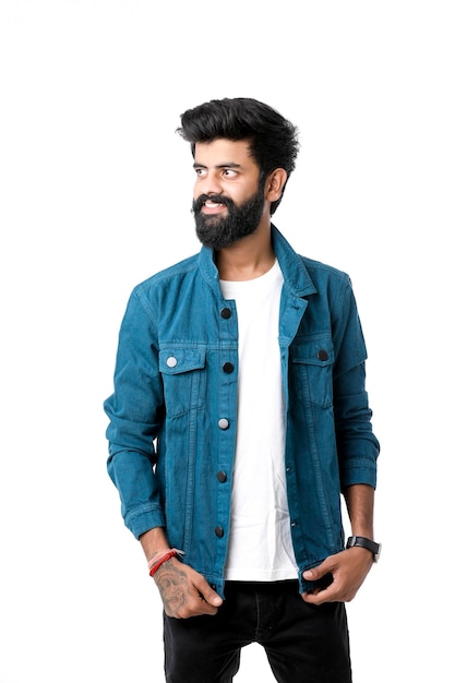 Young indian man wear jacket and giving expression over white background